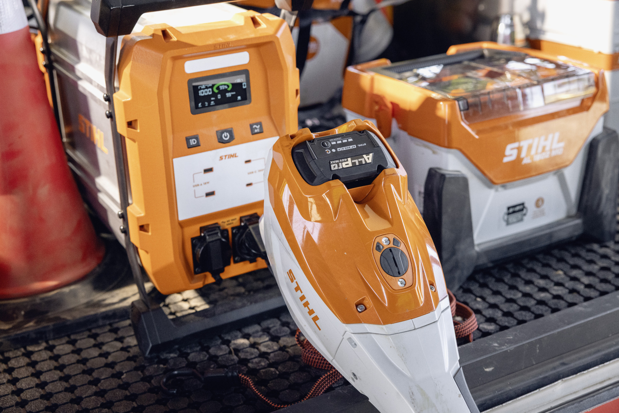  Mobile charger STIHL AL 1802 MO and power bank STIHL PS 2000 ready to recharge ALLPRO batteries on the loading area