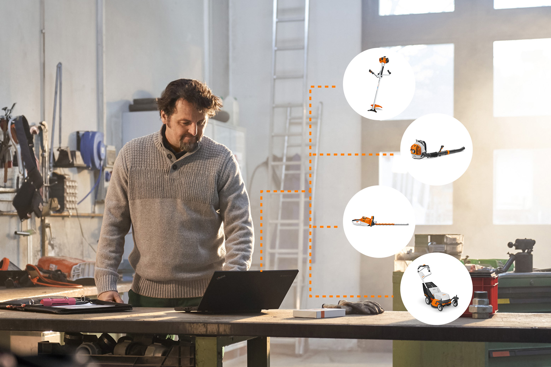Man at a laptop in a workshop, icons with STIHL products symbolise STIHL connected fleet management