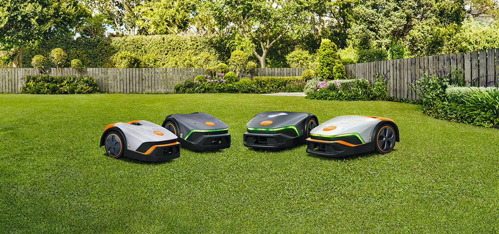 Four iMOW® on a lawn