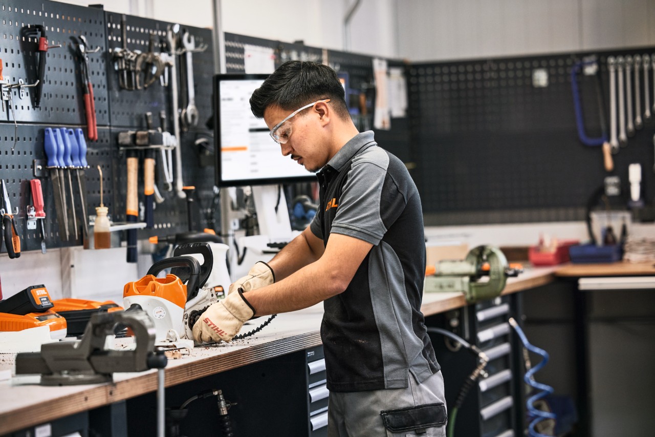 Young man working in a workshop