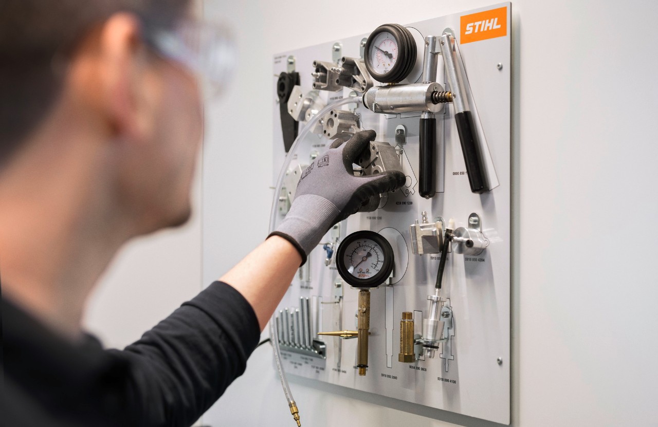 STIHL special tool's board mounted on wall